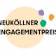 Das Logo des Neuköllner Engagementpreises zeigt den Schriftzug auf hellem Kreis mit bunten Punkten.